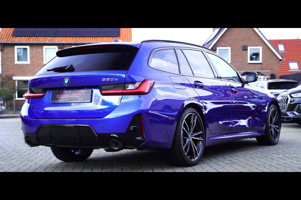 BMW 3 Serie Touring 330e High Executive | M-pakket | Facelift 2022 | Widescreen | Panorama | Adaptieve cruise | Portimao Blau |