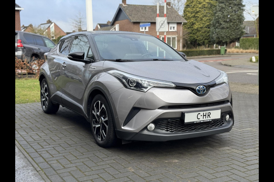 Toyota C-HR 1.8 Hybrid Style | Eerste eigenaar, Leer, JBL, Dodehoekherkenning, Parkeersensoren, Keyless, Bi-Tone, Weinig KM