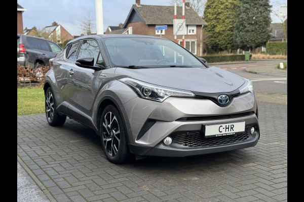 Toyota C-HR 1.8 Hybrid Style | Eerste eigenaar, Leer, JBL, Dodehoekherkenning, Parkeersensoren, Keyless, Bi-Tone, Weinig KM