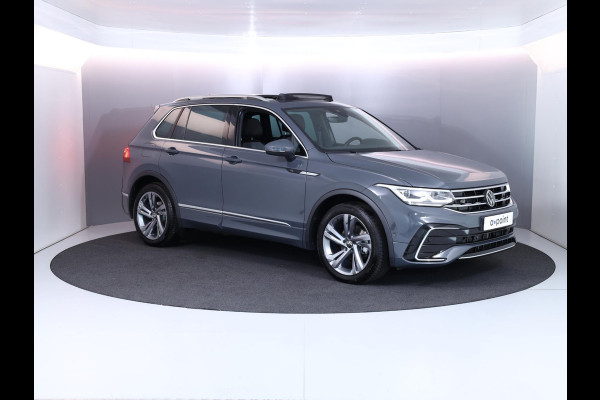 Volkswagen Tiguan 1.5 TSI R-Line Business 150 pk Automaat (DSG) |Private lease vanaf € 795,- pm | Verlengde garantie | Navigatie | Panoramadak | Elektr. trekhaak | Parkeersensoren (Park assist) | Achteruitrijcamera | Stoelverwarming | R-Line |