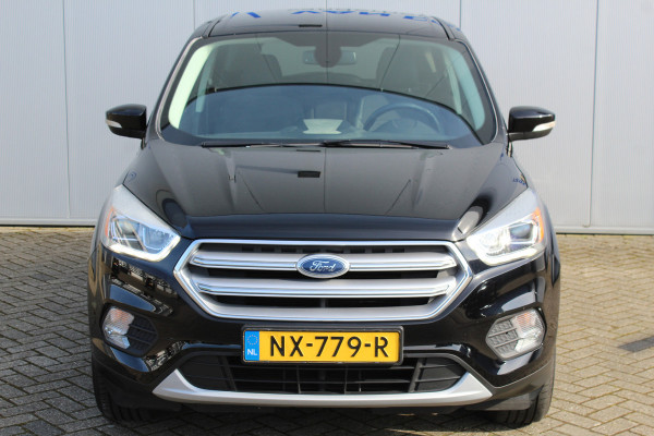 Ford Kuga 1.5-150pk EcoBoost Titanium. Nette goed onderhouden Ford Kuga. LET OP caravanbezitters: trekgewicht 2.000kg ! Volautm. airco, voorraam verwarming, elektr. trekhaak, navigatie, telefoonvoorb., LM wielen, metallic lak etc.