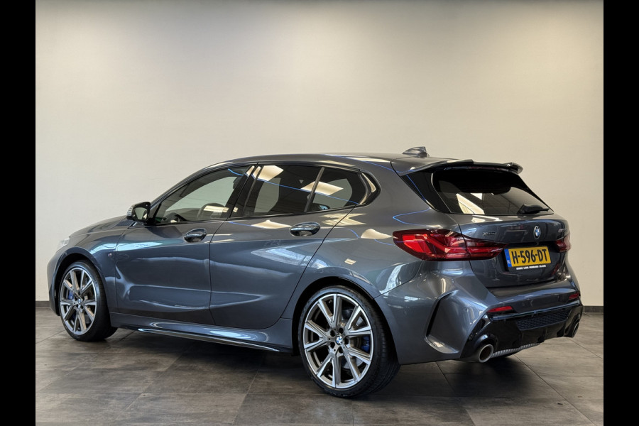 BMW 1-serie M135i xDrive High Executive Edition 306PK Headup Display Sportuitlaat Navigatie PDC VCP Cruise Control 19LMV  Volleder interieur Schaal stoelen 2 Jaar garantie mogelijk* ( vraag naar de voorwaarde)