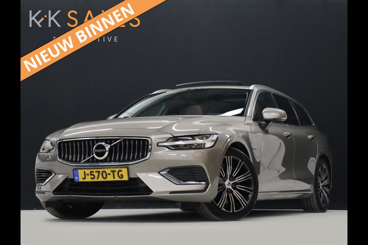 Volvo V60 2.0 T6 Recharge AWD Business Pro [SCHUIFKANTELDAK, TREKHAAK UITKLAPBAAR, STUURVERWARMING, STOELVERWARMING ACHTER, APPLE CARPLAY, ANDROID, NIEUWSTAAT]