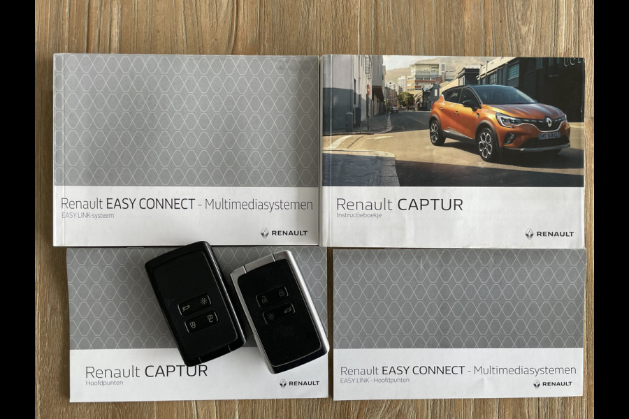 Renault Captur 1.0 TCe 100 Bi-Fuel Business Zen uitgerust met comfort en parking pakket met o.a. Climate control - Cruise control - Parkeersens. V+A - Navi full map - A-uitrijcamera - LED verlicht. - Trekhaak - Regensensor - rijstrook sensor - hill hold