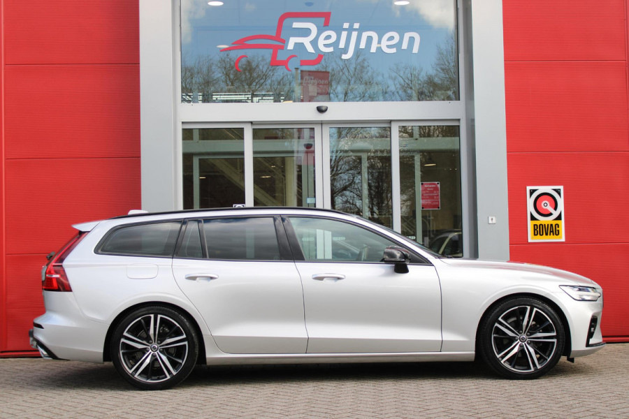 Volvo V60 2.0 T4 R-DESIGN 190PK AUTOMAAT | ZEER LAGE KILOMETERSTAND | 19" 5 TRIPPLE SPAAKS BLACK / DIAMOND CUT LICHTMETALEN VELGEN | ELEKTRISCH WEGKLAPBARE TREKHAAK | 1800KG TREKGEWICHT! | NAVIGATIE | APPLE CARPLAY/ANDROID AUTO | ACTIVE HIGH BEAM FULL LED KOPLAMPEN | ACHTERUITRIJ CAMERA | PARKEERSENSOREN VOOR EN ACHTER | LEDEREN BEKLEDING | STOEL VERWARMING | ELEKTRISCH BEDIENBARE VOORSTOELEN MET GEHEUGENFUNCTIE | ELEKTRISCH BEDIENBARE ACHTERKLEP | ADAPTIVE CRUISE CONTROL |