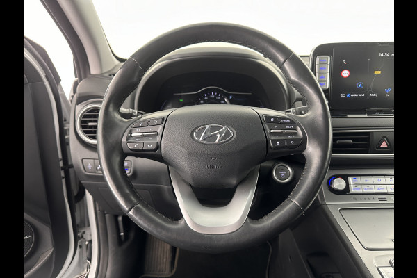 Hyundai Kona EV Premium 64 kWh (INCL-BTW) *FULL-LEATHER | HEAD-UP | FULL-LED | NAVI-FULLMAP | DAB | ADAPTIVE-CRUISE | KRELL-AUDIO | KEYLESS | CAMERA | BLIND-SPOT | LANE-ASSIST | DIGI-COCKPIT | COMFORT-SEATS | 17''ALU*