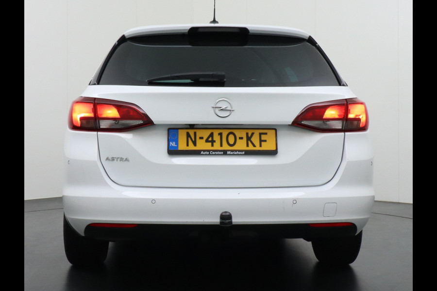 Opel Astra Sports Tourer T111PK Design&Tech Trekhaak Apple Carplay Android Auto Camera AGR-Stoel Navi Ecc Led-Matrix Lane Assist Pdc DAB+ Regen-Lichtsensor Bluetooth 1e Eigenaar Zeer Compleet!