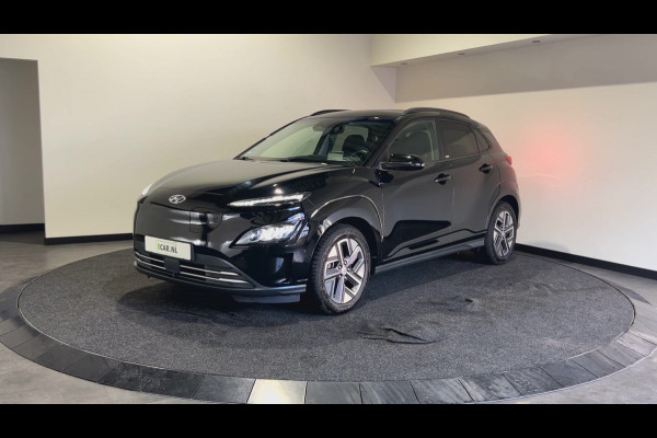 Hyundai Kona EV Premium 64 kWh | Warmtepomp | Verwarmde voorstoelen | Sensoren voor en achter |  SoH (batterijcheck) 100 % score!