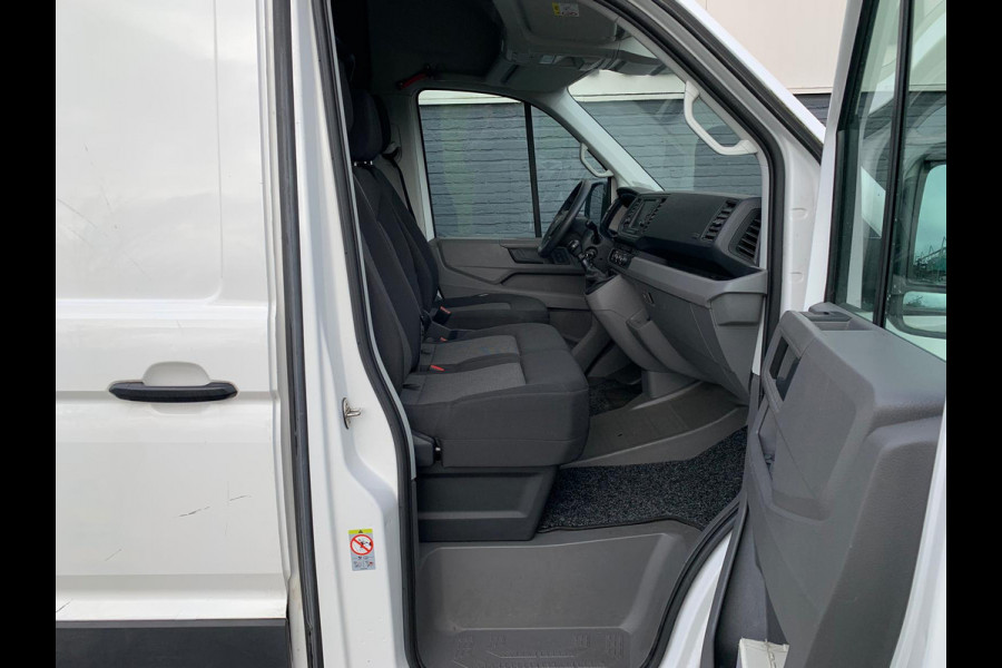 Volkswagen Crafter 2.0TDI L3H2 3p.Navigatie PDC-a+v Airco Cruise-Control Licht-Regensensor Dab+ Bluetooth Verwarmbare voorruit+ruitensproeiers Betonplex Lat-om-Lat Betimmering Schuifdeur 1e Eigenaar Euro 6 2.500KG trekvermogen
