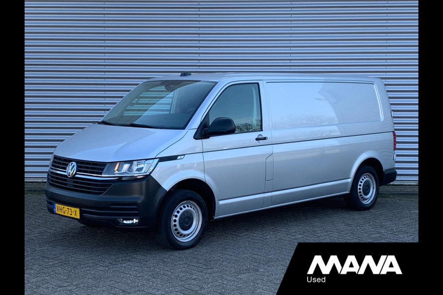 Volkswagen Transporter 2.0TDI L2H1 28 Airco Cruise Sensoren Trekhaak Betonplex Airbag 12V CarPlay Wandbekleding Bijrijdersbank DIN