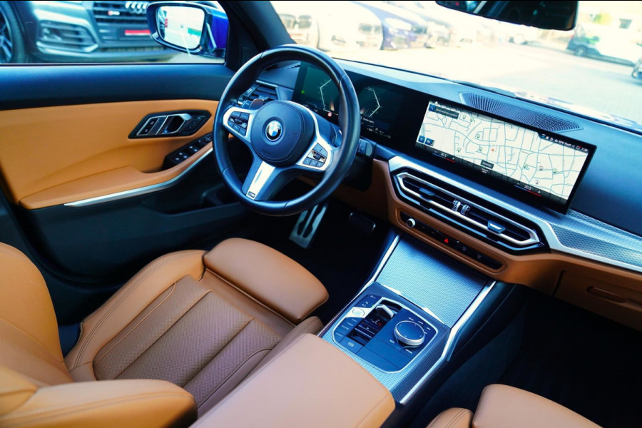 BMW 3 Serie Touring 330e High Executive | M-pakket | Facelift 2022 | Widescreen | Panorama | Adaptieve cruise | Portimao Blau |