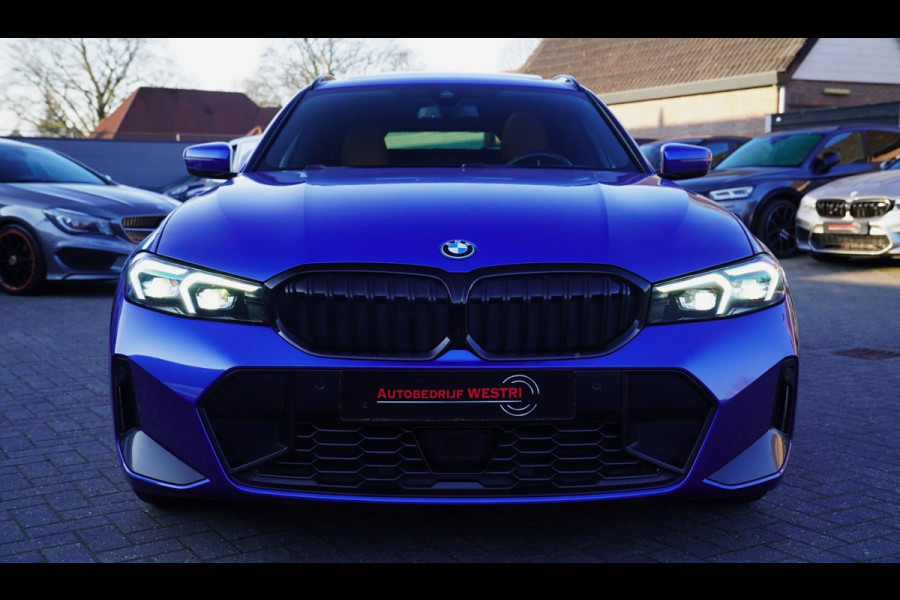 BMW 3 Serie Touring 330e High Executive | M-pakket | Facelift 2022 | Widescreen | Panorama | Adaptieve cruise | Portimao Blau |