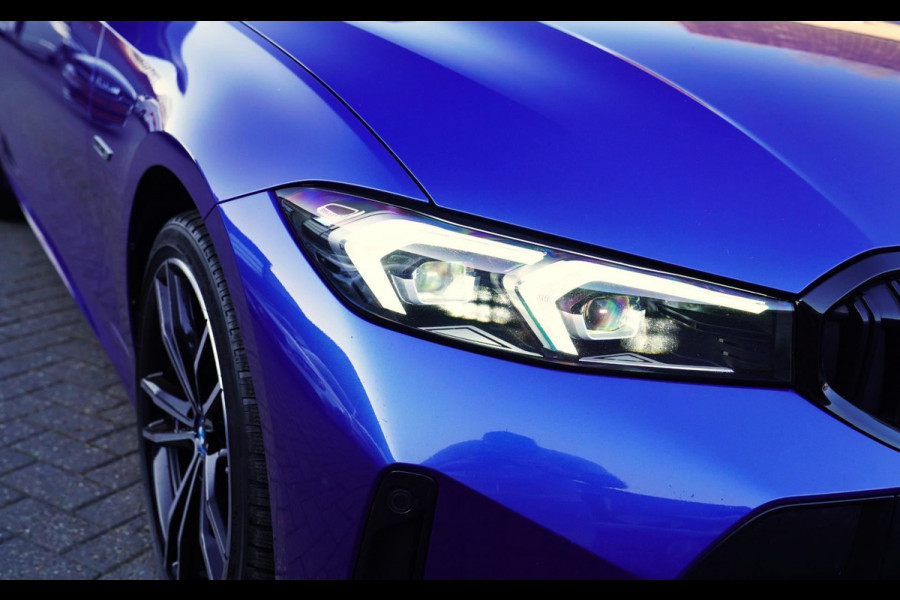 BMW 3 Serie Touring 330e High Executive | M-pakket | Facelift 2022 | Widescreen | Panorama | Adaptieve cruise | Portimao Blau |