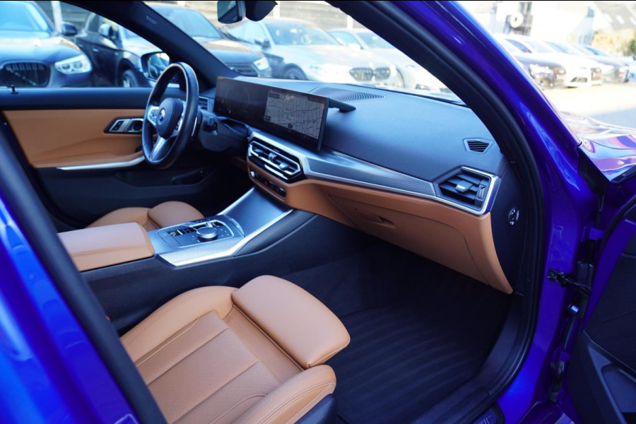 BMW 3 Serie Touring 330e High Executive | M-pakket | Facelift 2022 | Widescreen | Panorama | Adaptieve cruise | Portimao Blau |