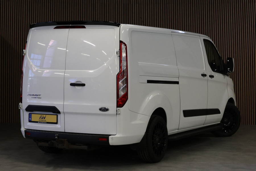 Ford Transit Custom 340 2.0 TDCI L2H1 | L+R Schuifdeur | Navigatie | Blind Spot | CarPlay | Camera | Standkachel | Trekhaak | 3-Zitter | Nieuwe APK | Onderhoudsbeurt
