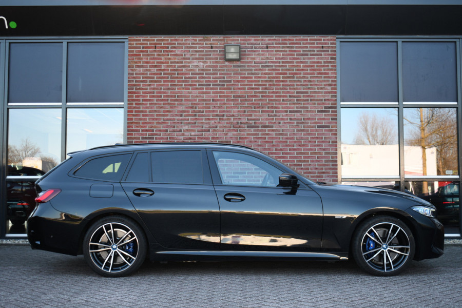BMW 3 Serie Touring 330e M-Sport Pano Trekh ACC El-zetel HUD Carbon 19inch Adp-onderstel