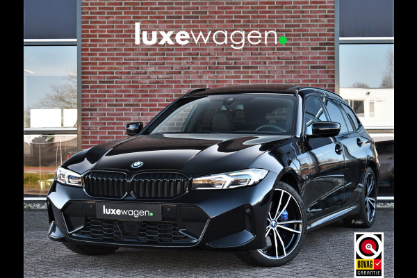 BMW 3 Serie Touring 330e M-Sport Pano Trekh ACC El-zetel HUD Carbon 19inch Adp-onderstel