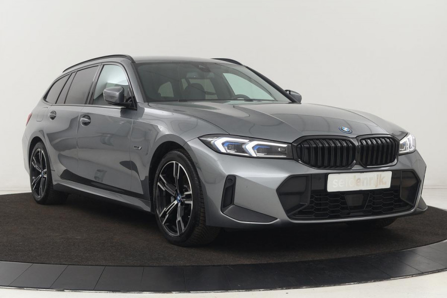 BMW 3-serie 320e M Sport | Head-Up | Stoel & stuurverwarming | Adaptive cruise | Sportstoelen | Adaptief LED | Sfeerverlichting | Camera | Carplay | Leder/Alcantara