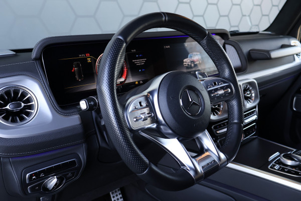 Mercedes-Benz G-Klasse 63 AMG STOELVERWARMING | TREKHAAK | AMBIENTEVERLICHTING | NAPPA LEDER |  DAK | BURMESTER AUDIO | 360 CAMERA | MEMORY | SUÉDE HEMELBEKLEDING | SPORTUITLAAT | EXTRA GROTE BENZINETANK | ETC. G63