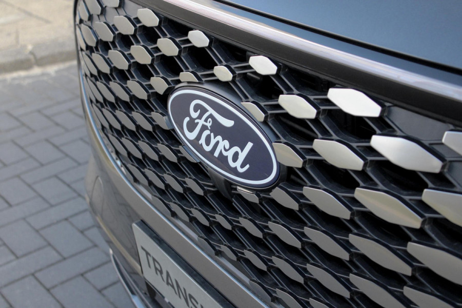 Ford E-Transit Cust. 320 L2H1 Limited 65 kWh 218pk | VOORRAAD | Inklapbare trekhaak | 17 inch lichtmetalen velgen (Carbonised Grey) | Driver Assistent Pack Premium | AGM accu | 3-fase laadkabel mode 3 32A, 10 meter | Centrale dubbele vergrendeling | Vehicle Integration System