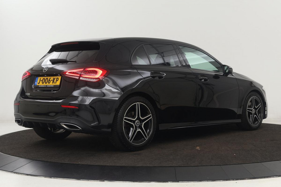 Mercedes-Benz A-Klasse 180 Business Solution AMG | Stoelverwarming | Carplay | Camera | Sfeerverlichting | Navigatie | Full LED | Leder/Alcantara | Widescreen