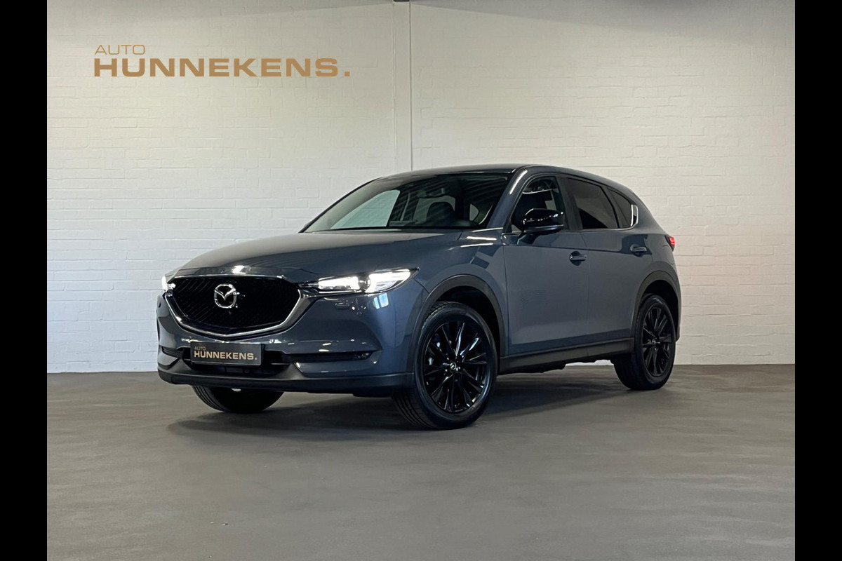 Mazda CX-5 2.0 Edition 100 | Trekhaak | Head-up | Camera | Leder/Alcantara | Carplay | Cruise & Climate c. Mazda CX-5 2.0 Edition 100 | Trekhaak | Head-up | Camera | Leder/Alcantara | Carplay | Cruise & Climate c.