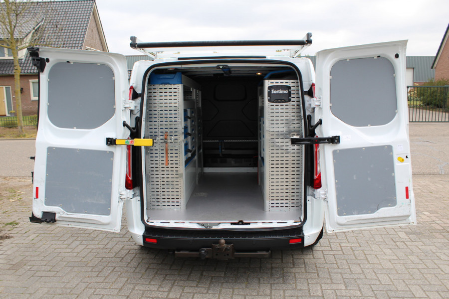 Ford Transit Custom 280 2.0 TDCI 105PK Euro6 Trend ✓ Sortimo inrichting ✓ imperiaal ✓ trekhaak ✓ navigatie