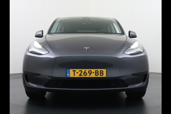 Tesla Model Y RWD 60kWh LFP 300PK Warmtepomp FSD-Computer 3 Auto-Pilot Sleutel-loos(via-GSM) Leder Premium Audio Camera's Panormadak Adap.Crui Elektr. Acht.klep WiFi Priv.Glass AEB ASR ESP IsoFix Connected-Services 1600kg Trekvermogen Orig.NLse Auto Accu-Garantie 6-2031/160.000km 1e Eigenaar 11kw thuis of snelladen tot 170kWh Slechts 13dkm