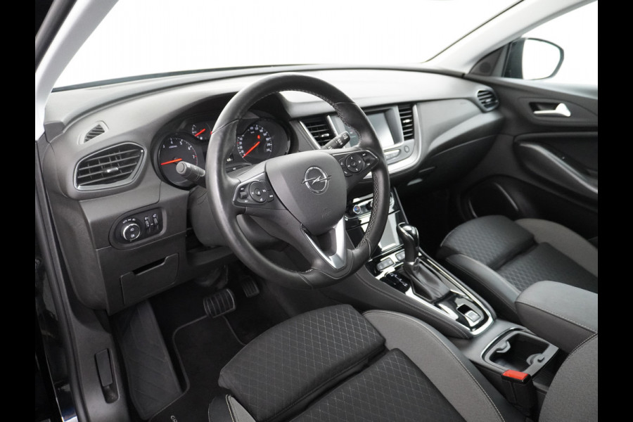 Opel Grandland X 131pk AUT. Navi Pdc Apple Carplay Android Trekhaak Ecc Cruise control AGR-Comfort Stoelen Verwarmd 1.2 Turbo Verkeersbord detectie Regen/Lichtsensor Led Wifi Rijstrooksensor Business Executive