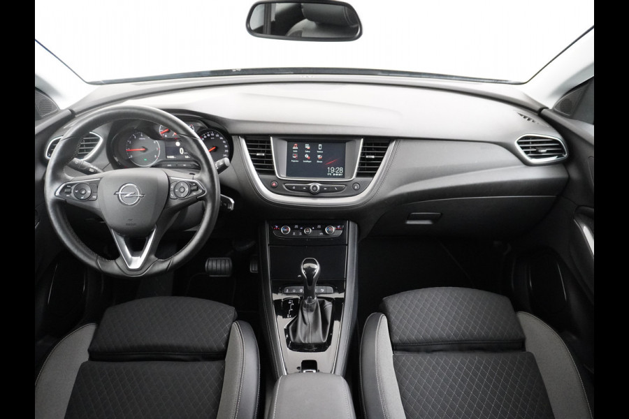 Opel Grandland X 131pk AUT. Navi Pdc Apple Carplay Android Trekhaak Ecc Cruise control AGR-Comfort Stoelen Verwarmd 1.2 Turbo Verkeersbord detectie Regen/Lichtsensor Led Wifi Rijstrooksensor Business Executive