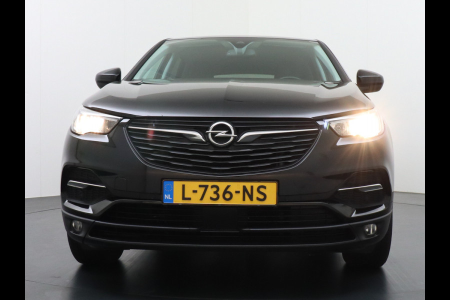 Opel Grandland X 131pk AUT. Navi Pdc Apple Carplay Android Trekhaak Ecc Cruise control AGR-Comfort Stoelen Verwarmd 1.2 Turbo Verkeersbord detectie Regen/Lichtsensor Led Wifi Rijstrooksensor Business Executive