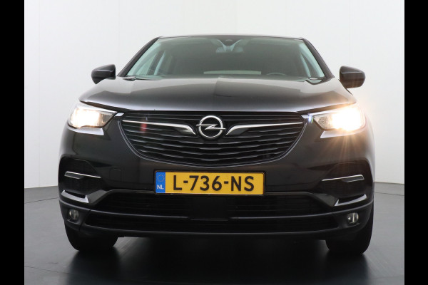 Opel Grandland X 131pk AUT. Navi Pdc Apple Carplay Android Trekhaak Ecc Cruise control AGR-Comfort Stoelen Verwarmd 1.2 Turbo Verkeersbord detectie Regen/Lichtsensor Led Wifi Rijstrooksensor Business Executive