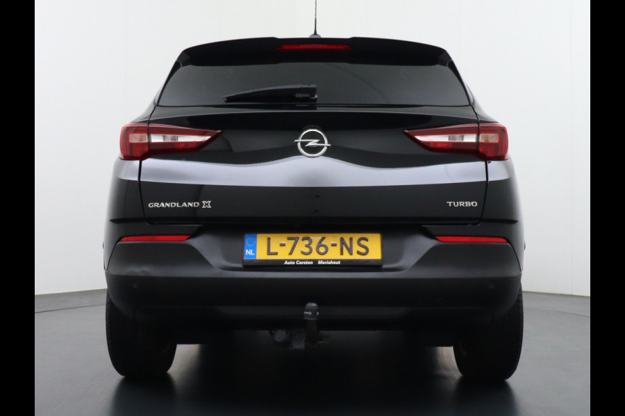 Opel Grandland X 131pk AUT. Navi Pdc Apple Carplay Android Trekhaak Ecc Cruise control AGR-Comfort Stoelen Verwarmd 1.2 Turbo Verkeersbord detectie Regen/Lichtsensor Led Wifi Rijstrooksensor Business Executive