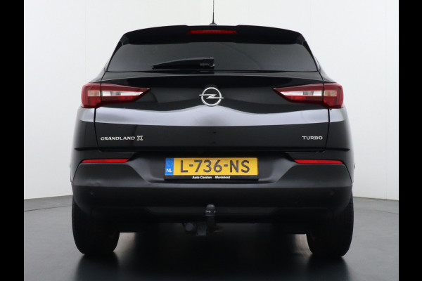 Opel Grandland X 131pk AUT. Navi Pdc Apple Carplay Android Trekhaak Ecc Cruise control AGR-Comfort Stoelen Verwarmd 1.2 Turbo Verkeersbord detectie Regen/Lichtsensor Led Wifi Rijstrooksensor Business Executive