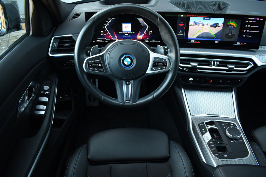 BMW 3 Serie Touring 320e M-Sport ACC HUD Sfeer Camera HiFi Stuurverw