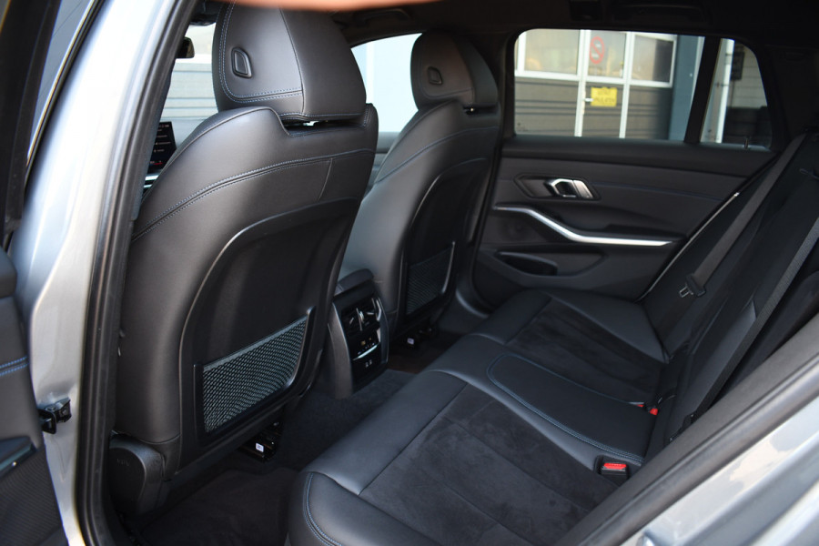 BMW 3 Serie Touring 320e M-Sport ACC HUD Sfeer Camera HiFi Stuurverw