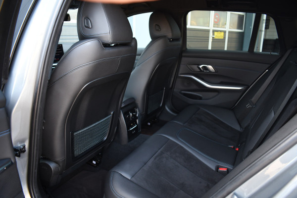 BMW 3 Serie Touring 320e M-Sport ACC HUD Sfeer Camera HiFi Stuurverw