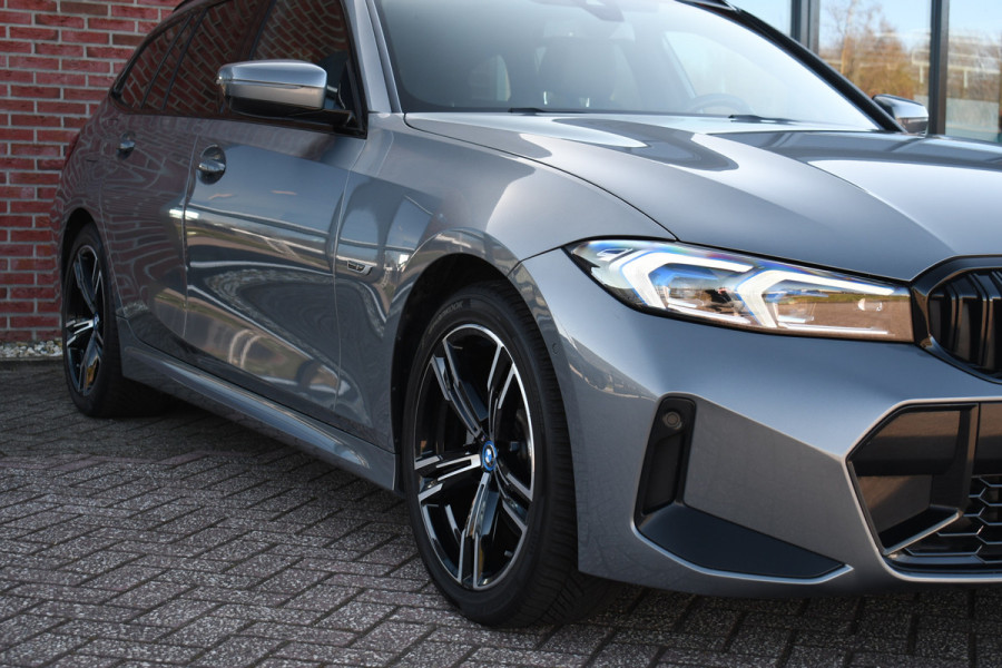 BMW 3 Serie Touring 320e M-Sport ACC HUD Sfeer Camera HiFi Stuurverw