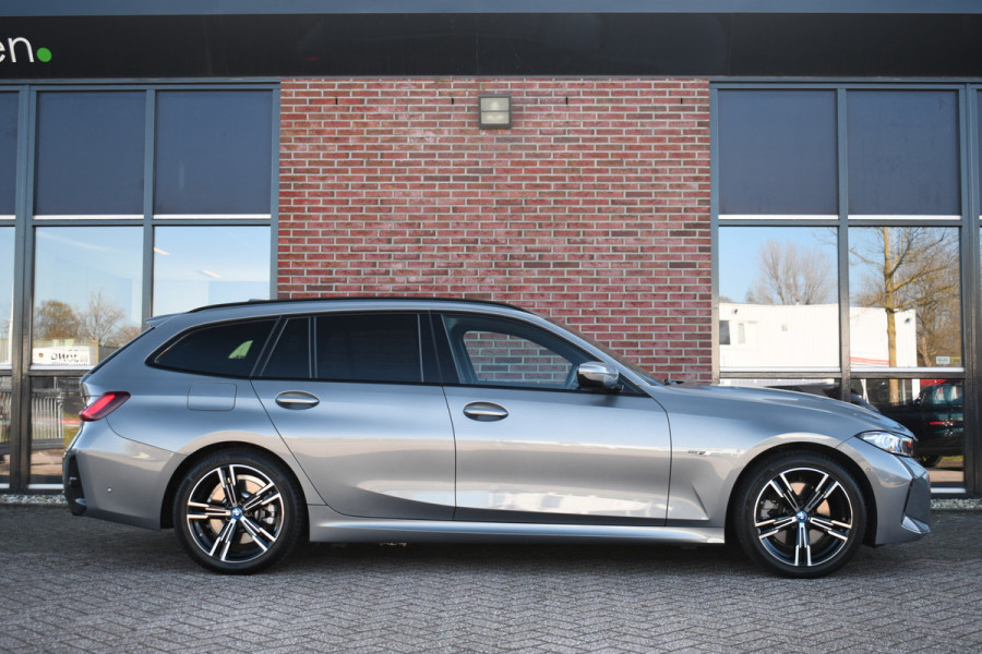 BMW 3 Serie Touring 320e M-Sport ACC HUD Sfeer Camera HiFi Stuurverw