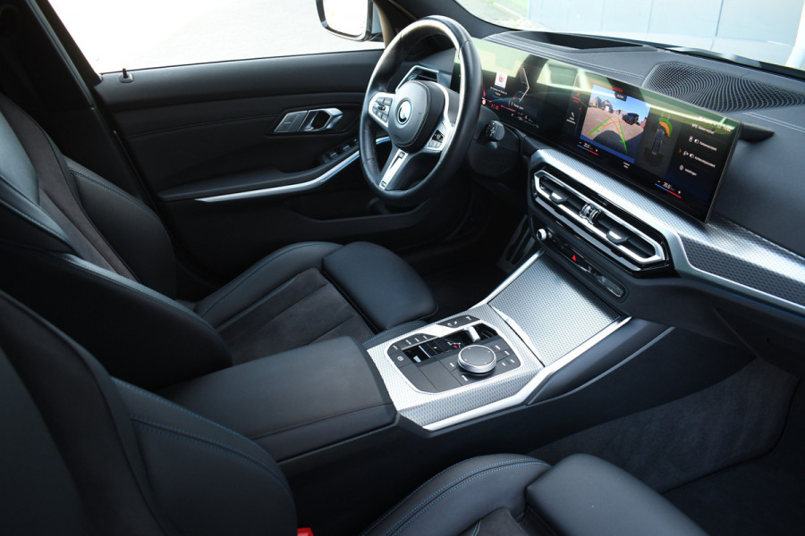 BMW 3 Serie Touring 320e M-Sport ACC HUD Sfeer Camera HiFi Stuurverw