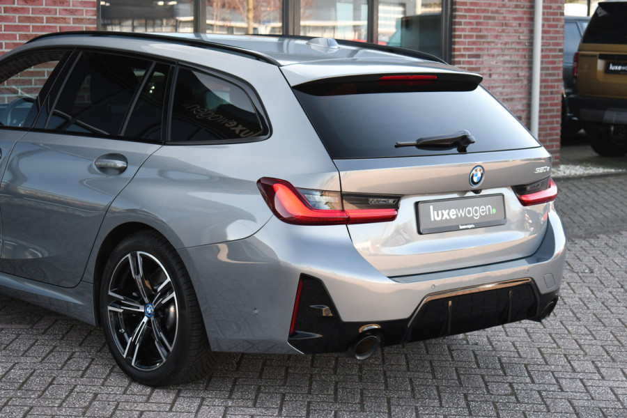 BMW 3 Serie Touring 320e M-Sport ACC HUD Sfeer Camera HiFi Stuurverw