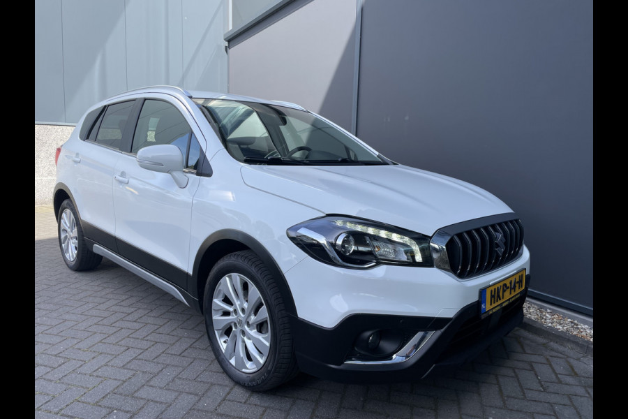 Suzuki S-Cross 1.0 Boosterjet Exclusive Climate control - Cruise control - Navi - Parkeersensoren V+A - A-uitrijcamera - MFL-stuurwiel - Apple carplay/Android auto - Mistlampen voor- LMV 17"- Ramen E-V+A - Spiegels E-Verstel en ver
