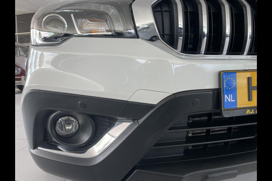 Suzuki S-Cross 1.0 Boosterjet Exclusive Climate control - Cruise control - Navi - Parkeersensoren V+A - A-uitrijcamera - MFL-stuurwiel - Apple carplay/Android auto - Mistlampen voor- LMV 17"- Ramen E-V+A - Spiegels E-Verstel en ver