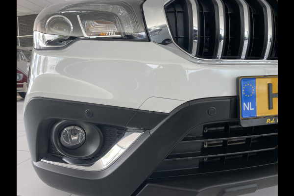 Suzuki S-Cross 1.0 Boosterjet Exclusive Climate control - Cruise control - Navi - Parkeersensoren V+A - A-uitrijcamera - MFL-stuurwiel - Apple carplay/Android auto - Mistlampen voor- LMV 17"- Ramen E-V+A - Spiegels E-Verstel en ver