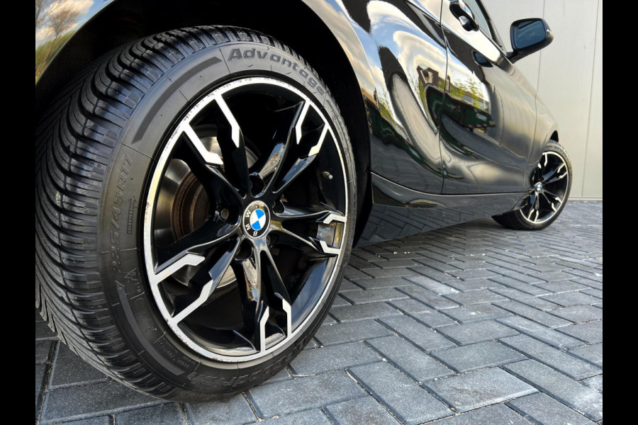 BMW 1-serie 118i Executive Navi_PDC)_Cruise_Clima_LED