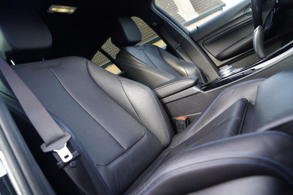 BMW 1-serie 118i High Executive | M-pakket | Facelift | Cruise control | 100% onderhouden | Shadowline | Stoelverwarming | DAB |