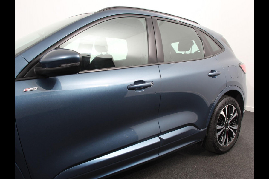 Ford Kuga 2.5 PHEV 224pk ST-Line Automaat Adaptieve cruise control Parkeersensoren Afneembare trekhaak Navigatie LED Elektrische kofferbak Verwarmde voorstoelen Climate control HUD