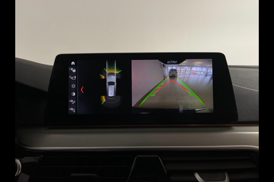 BMW 5 Serie Touring 520d High Executive AUTOMAAT PANO AIRCO NAVI CRUISE BLUETOOTH HEAD UP DISPLAY LEER TREKHAAK VELGEN NIEUWSTAAT