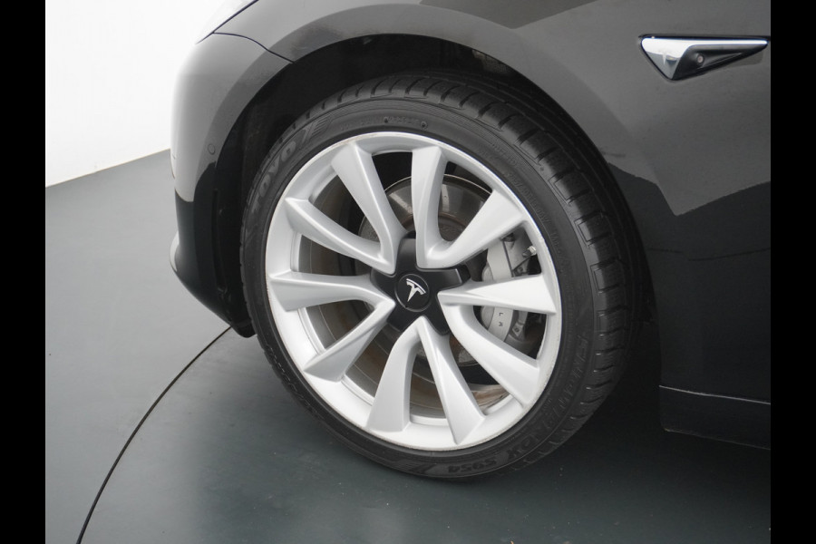 Tesla Model 3 RWD SR+ 60kWh 325PK Trekhaak Lmv 19" AutoPilot FSD-3 Comp. Premium Luidsprekers Leder PanoDak Adaptive-Cruise Camera's Elektr.-S Navi LED Comfortstoelen ACC DAB Voorverwarmen interieur en Keyless via App One-Pedal-Drive Origineel Nederlandse auto tot 11kw laden thuis! Garantie Accu tot 05-12-2027 max 160.000km 1.584kg licht! 1.000kg trekvermogen