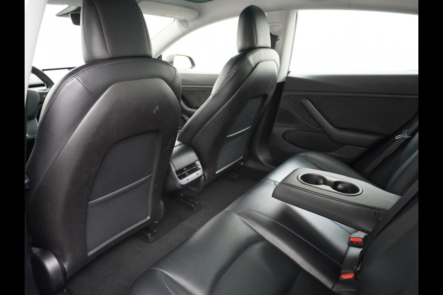 Tesla Model 3 RWD SR+ 60kWh 325PK Trekhaak Lmv 19" AutoPilot FSD-3 Comp. Premium Luidsprekers Leder PanoDak Adaptive-Cruise Camera's Elektr.-S Navi LED Comfortstoelen ACC DAB Voorverwarmen interieur en Keyless via App One-Pedal-Drive Origineel Nederlandse auto tot 11kw laden thuis! Garantie Accu tot 05-12-2027 max 160.000km 1.584kg licht! 1.000kg trekvermogen